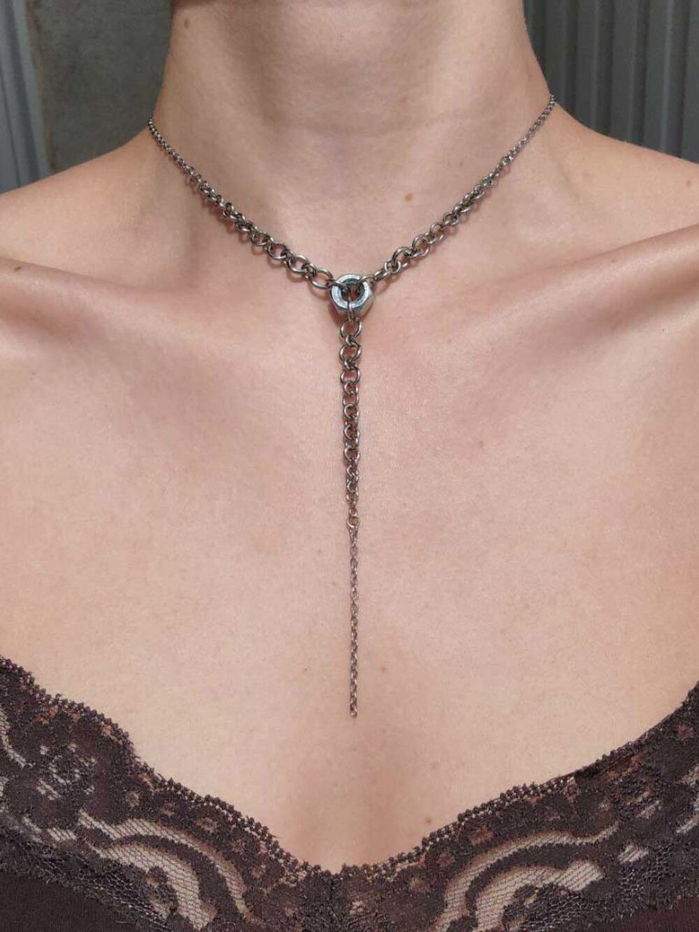 Gothic silver rosary necklace with a small silver chain